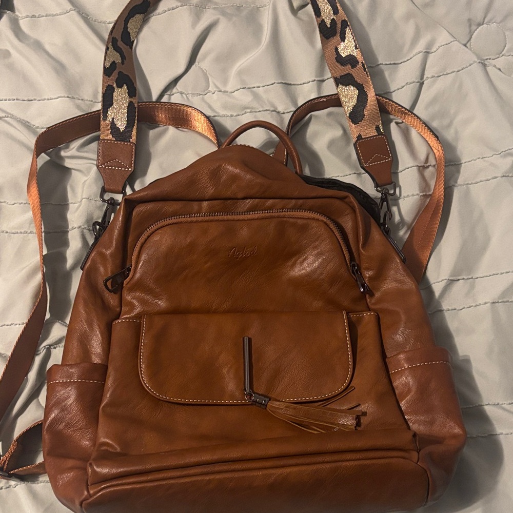 Brown Leather Backpack with Animal Print Straps